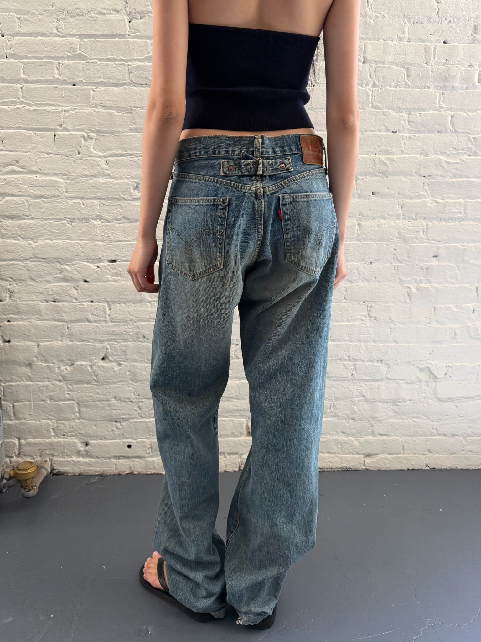 Vintage Levi’s Big L 701 CinchBack Light Blue Jeans